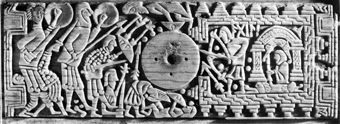 Крышка франкского гроба, изготовленная в Нортумбрии в начале VIII в. Легко представить, что такие изображения человека, защищающего свой дом от грабителей, были широко распространены в конце VIII века.